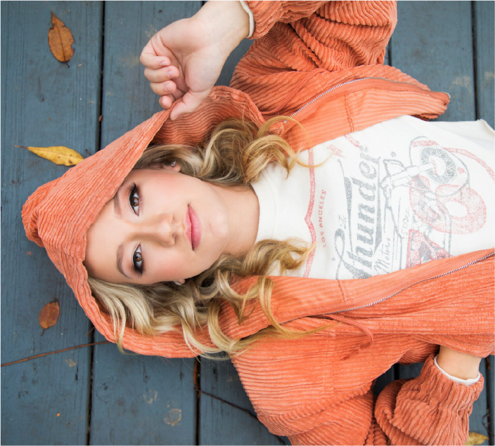 casual-portrait-woman-orange-hoodie